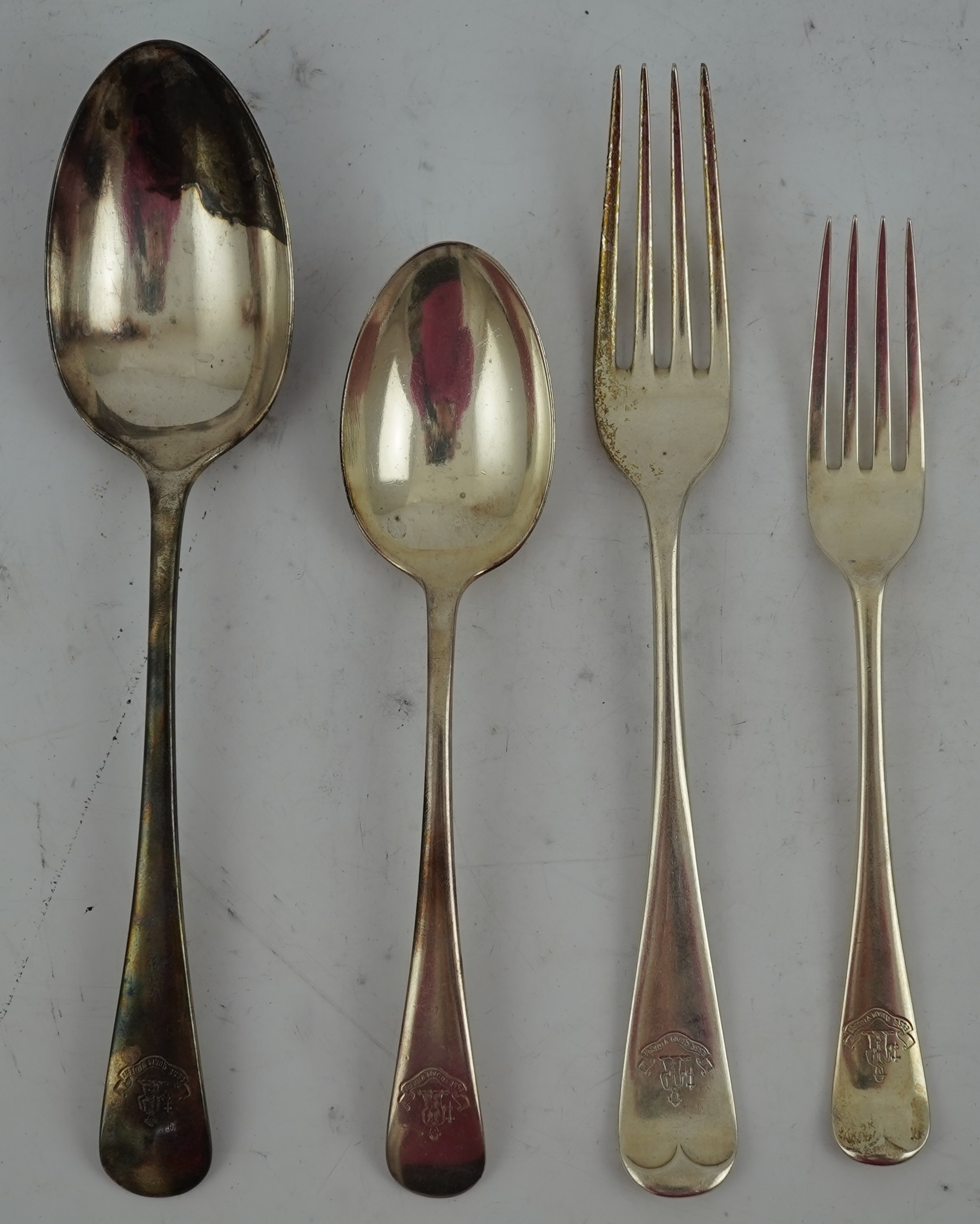 A harlequin part canteen of Edwardian and later silver Old English pattern flatware, various dates and makers